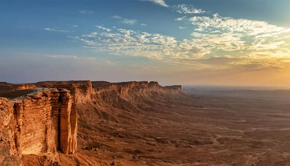 Panoramic view of Edge of the World Riyadh cliffs at sunset